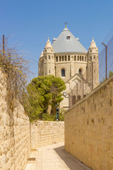Fototapeta na wymiar narrow streets of old Jerusalem. Armenian Church Cathedral