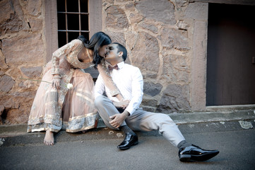 happy young Indian couple outdoors flirting having fun