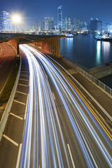 Fototapeta na wymiar Traffic at night with urban background