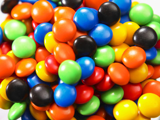 Fototapeta na wymiar close up of multicolor chocolate candy