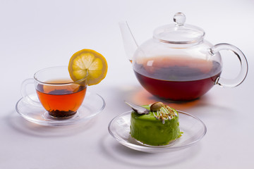 Tea with a delicious green dessert.