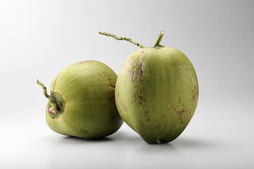 raw coconut on the plain background
