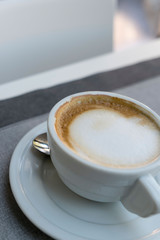 Coffee cup on restaurant table