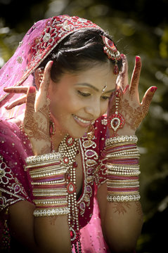 happy beautiful hindu Indian bride outdoors smiling having fun