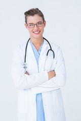 Fototapeta premium Doctor with arms crossed smiling at camera