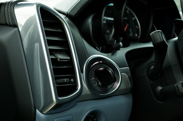 Modern car air conditioning system. Auto interior detail.