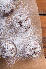 Homemade chocolate crinkles cookies with powdered sugar.