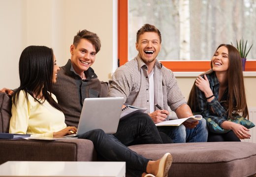 Group of students preparing for exams in apartment interior