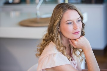 Thoughtful blonde woman