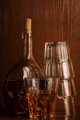 Bottle and glass with whisky