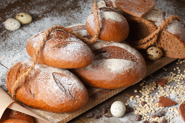 Variety of rye bread on a wooden background