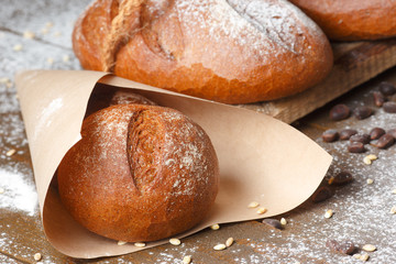 Variety of rye bread on a wooden background