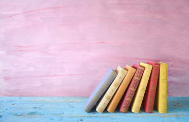 row of books, grungy background, free copy space