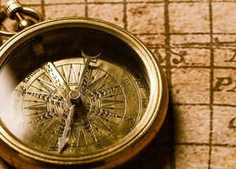 Map. Old compass on vintage map. Adventure stories background