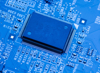 blue circuit board background of computer motherboard