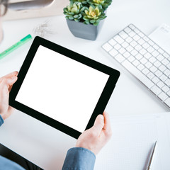 Businessman holding a tablet with a blank screen