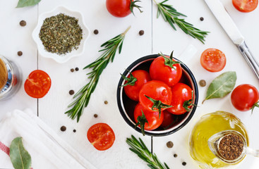 Ripe cherry tomatoes, olive oil and spices