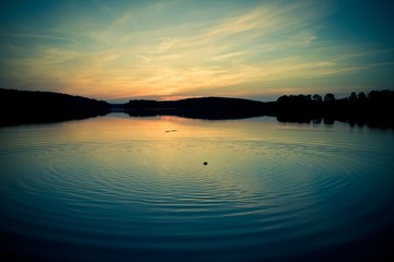 Obraz premium Vintage photo of lake sunset