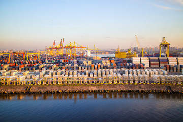 Fototapeta na wymiar Cargoes in sea port. Container Terminal