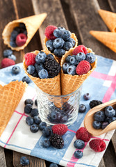 Fresh berries in waffle cone