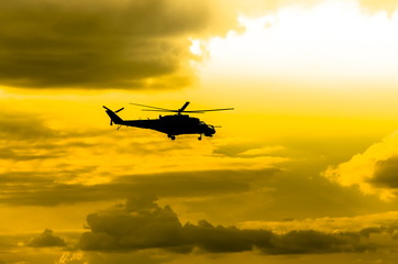Fototapeta na wymiar combat helicopters Mi-24 against the sky