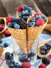Fresh berries in waffle cone