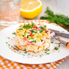 Fresh vegetable and crab salad with mayonnaise