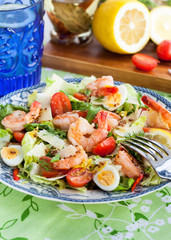 Fresh shrimps, eggs and vegetables salad