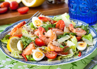 Fresh shrimps, eggs and vegetables salad