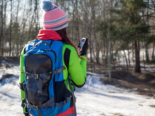 Hiker tracks his position at the gps © Sergey Mironov