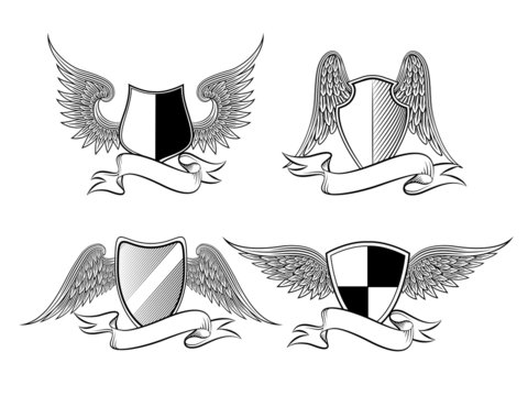Heraldic shields with wings