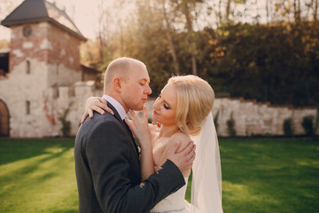 blonde bride with her groom