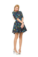 Woman in dark blue floral dress isolated on white