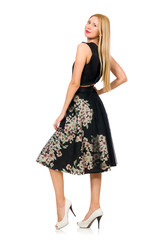 Woman in floral dark skirt isolated on white