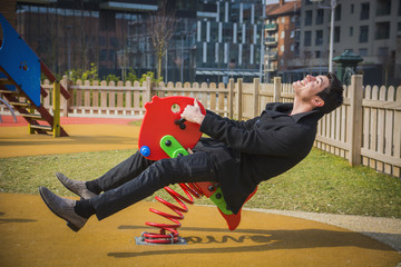 Young man reliving his childhood