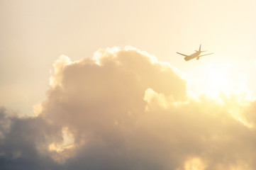 Airliner flying in the evening light