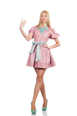 Fototapeta premium Woman in pink doll dress isolated on white