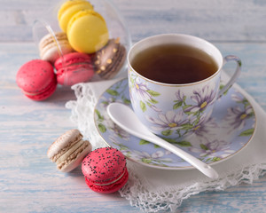Obraz na płótnie Canvas French Macarons with cup of tea