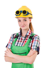 Female handyman in overalls isolated on white