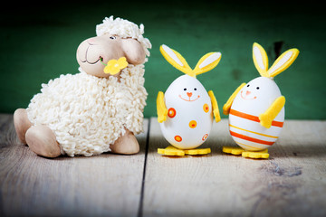 Easter decoration with eggs and cute lamb and bunny