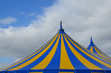 Blue and yellow circus big top tent