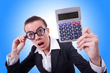 Nerd female accountant with calculator