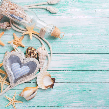 Marine items on wooden background.