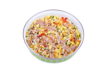 Raw meat with vegetables in a pan isolated on white background