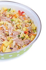 Raw meat with vegetables in a pan, stew