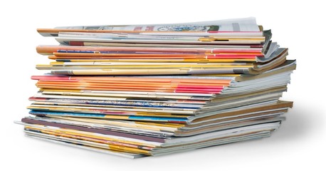 Article. Stack of magazines isolated on white background