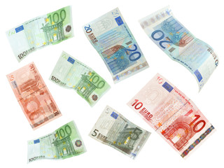 Flying Euro banknotes isolated on white