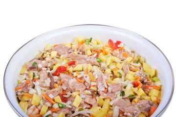 Raw meat with vegetables in a pan, stew