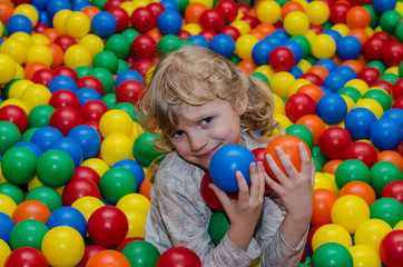 Fototapeta na wymiar happy girl playing with balls