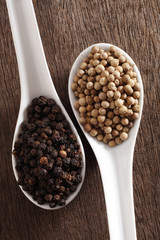 Black and white  peppercorns